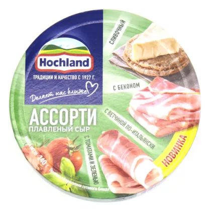 Сыр HOCHLAND круг"Ассорти зеленое"  (сливочный, с беконом, с томатами и зеленью, с ветчиной по-итальянски) 140 г 55%